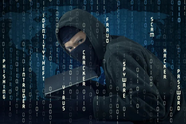 Hacker with binary code carrying notebook — Stock Photo, Image