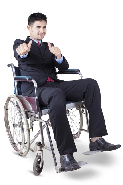 Hombre trabajador discapacitado mostrando pulgares hacia arriba —  Fotos de Stock