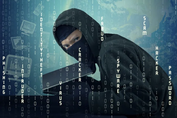 Thief with binary code stealing laptop — Stock Photo, Image