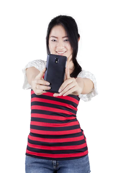 Girl taking self photo in studio — Stock Photo, Image