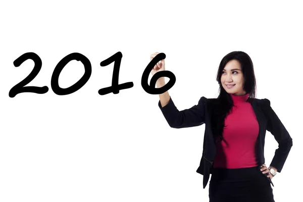 Bastante mujer de negocios escribir números 2016 — Foto de Stock