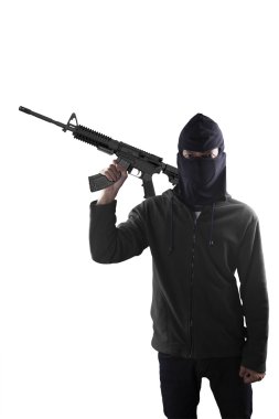 Terrorist with a machine gun over white clipart