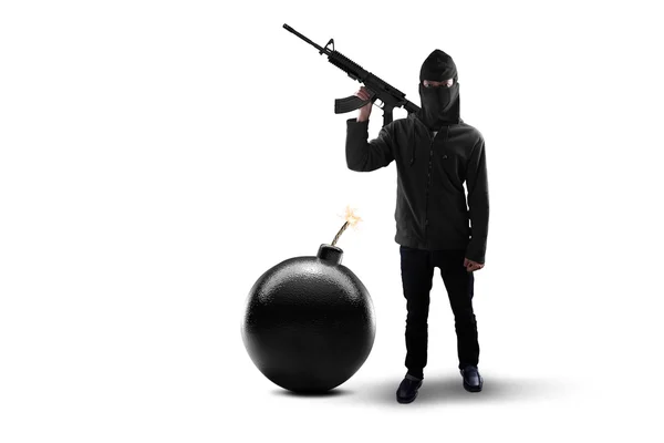 Buntownik z bomby i trzyma karabin maszynowy — Zdjęcie stockowe