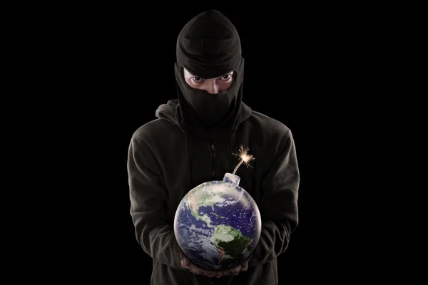 Terrorist holding bomb with globe — Stock Photo, Image