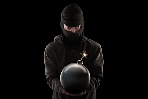 Bomba ve giyen maskesi cihatçı tutar — Stok fotoğraf