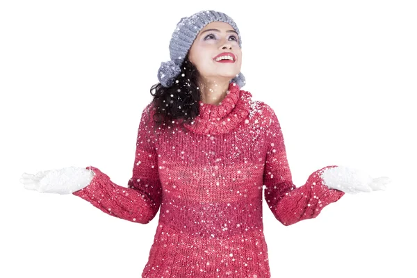 Pretty indian woman playing snow in studio — Stock Photo, Image