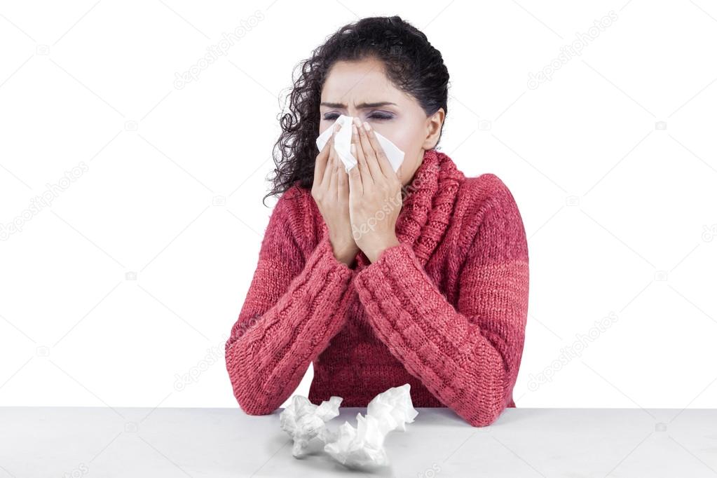Pretty indian woman has flu and fever