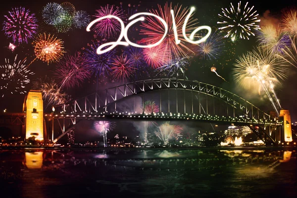 Fireworks with numbers 2016 over the bridge — Stock Photo, Image