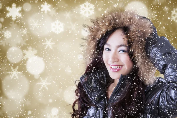 Cute girl with winter jacket and winter background — Stock Photo, Image