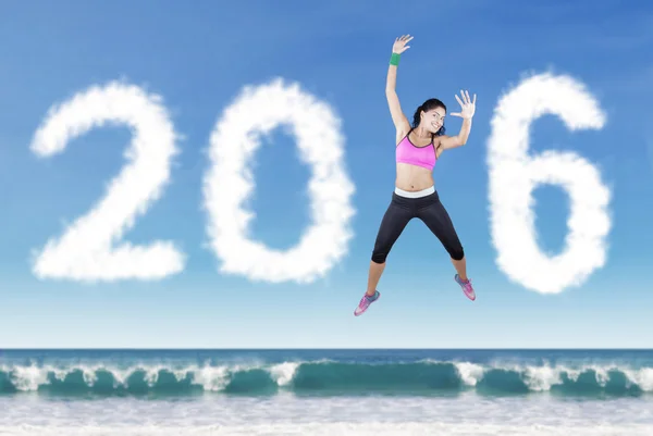 Indian Woman Jumping with Numbers 2016 — Stock Photo, Image