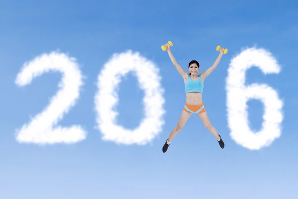 Woman Jumping with Numbers 2016 — Stock Photo, Image