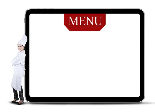 Шеф-повар опирается на меню — стоковое фото
