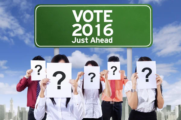 Group of unknown people and voting board — Stock Photo, Image