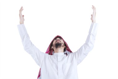 Arabic man praying while raise hands