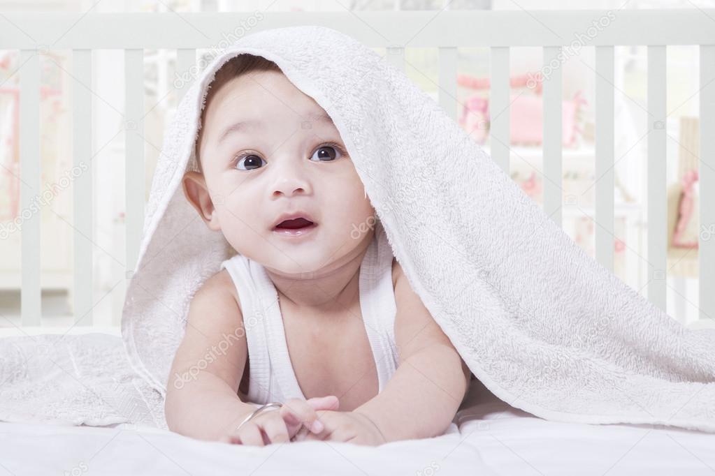 Sweet Baby Crawling on The Bedroom