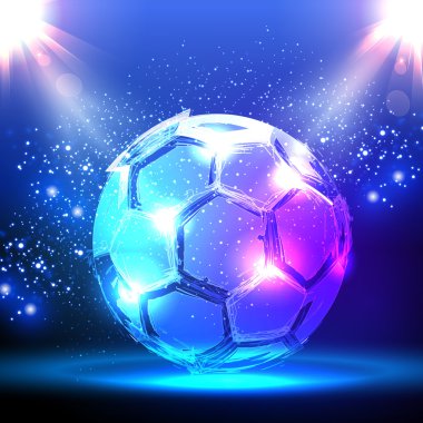 Mavi sahne ışıkları üzerinde futbol topu