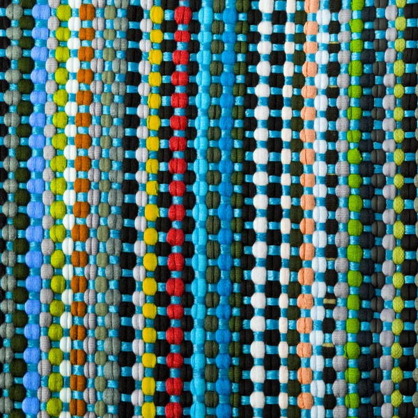五彩斑斓的非洲风格地毯的表面紧密相连 更多的这种主题和更多的纺织品在我的港口 — 图库照片