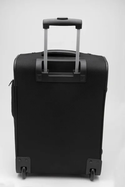 黑色行李箱 白色底座隔离 — 图库照片
