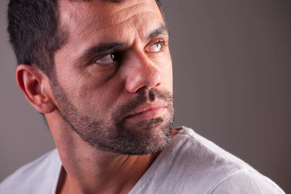 Young man looking scared — Stock Photo, Image