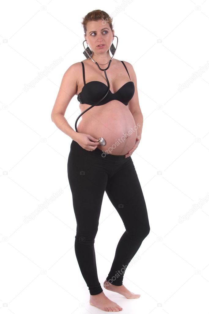 pregnant woman listening to her baby