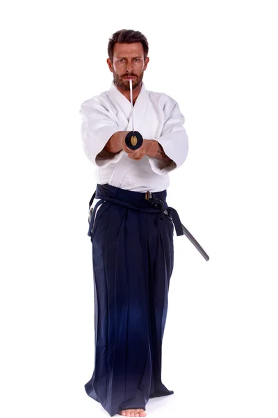 Aikido master pointing thw sword — Stock Photo, Image