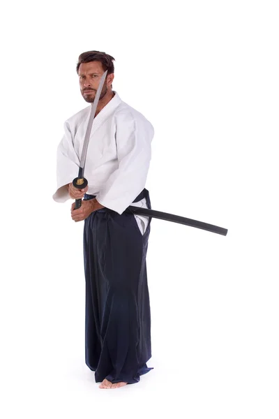 Aikido mastrer formazione woth spada Foto Stock Royalty Free