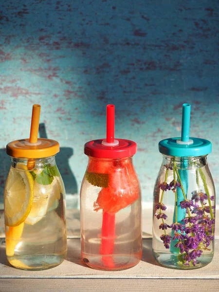 Homemade Lemonades Bottles Colorful Caps Plastic Straws Blue Vintage Backround — Stock Photo, Image