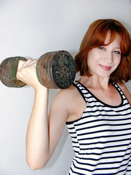 Girl with dumbbells — Stock Photo, Image