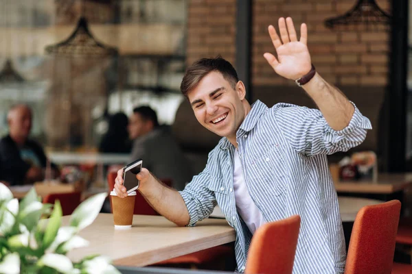 Handsome Brunet Man Smiling Hand Gesture Greeting Someone Cafe Morning — Stock Photo, Image