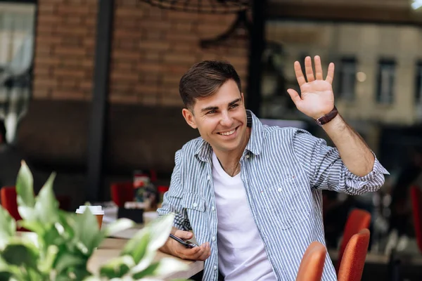 Handsome Brunet Man Smiling Hand Gesture Greeting Someone Cafe Morning — Stock Photo, Image