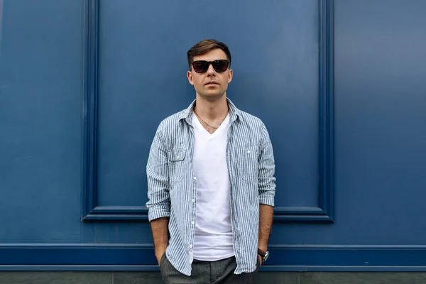 Handsome Brunette Man Sunglasses Blue Background — Stock Photo, Image