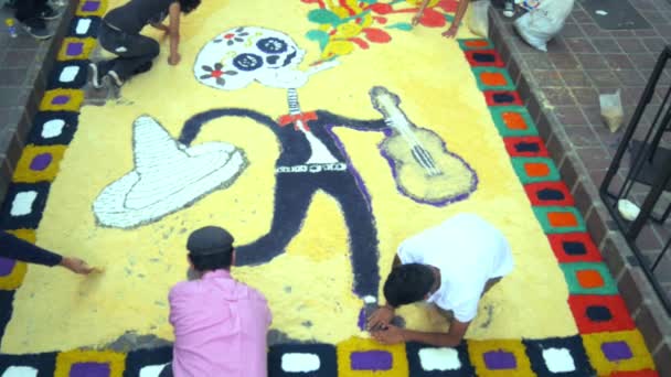 Students making carpet with flowers, — Stock Video
