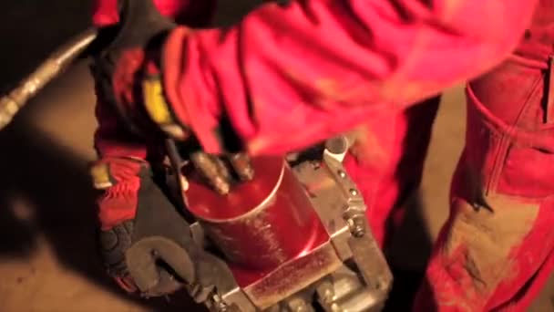 Firefighter preparing extrication tool — Stock Video