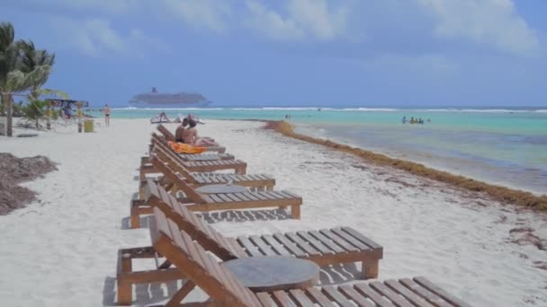 Caribbean beach with cruise ship in the back — Stock Video