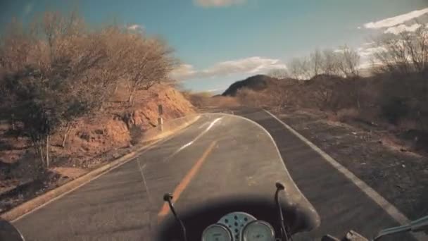 Ridding motorcycle in the mountains — Stock Video