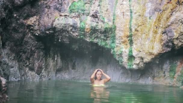 Woman taking a purifying bath — Stock Video