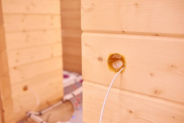 installation of electrical wiring inside a wooden house, nobody