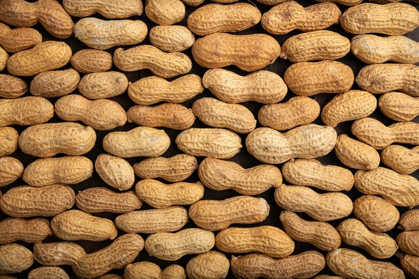 Ungeschälte Erdnüsse Hintergrund Arachis Hypogaea Essbare Samen Ernährungskonzept Für Gesunde — Stockfoto