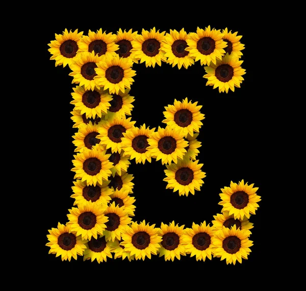 Letra Mayúscula Hecha Girasoles Amarillos Aislados Sobre Fondo Negro Elemento — Foto de Stock