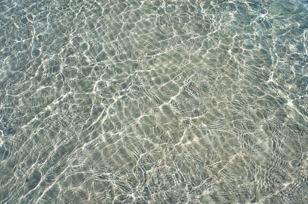 Fehér korall homok és kristálytiszta vizére. Absztrakció. háttér. — Stock Fotó