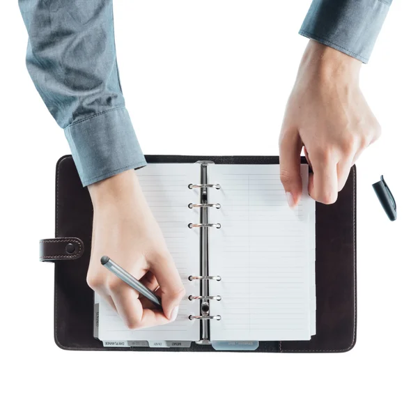 Asistente femenina horario de escritura — Foto de Stock