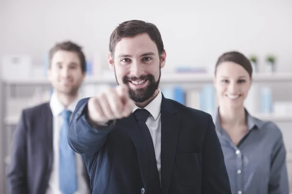 Confident business man pointing — Stock Photo, Image