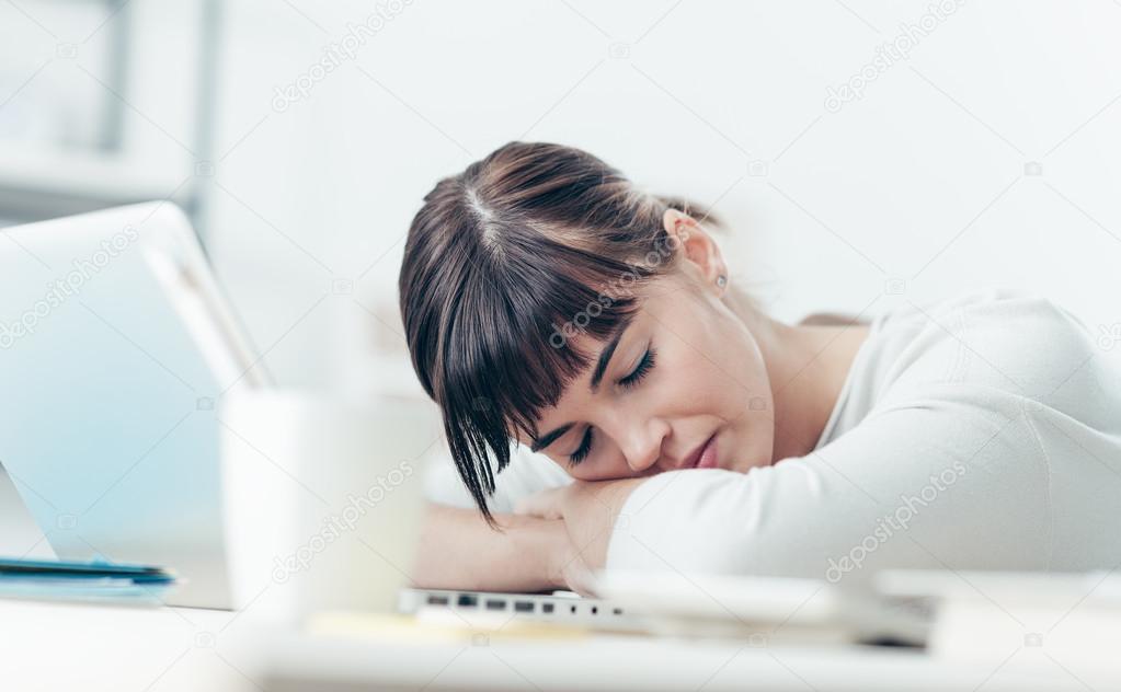 Young tired woman sleeping