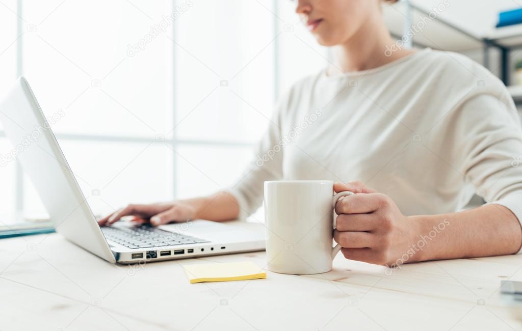 Woman having a coffee break