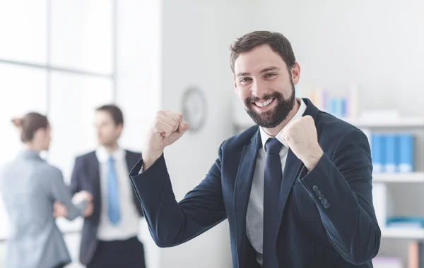 Hombre de negocios alegre con los puños levantados —  Fotos de Stock