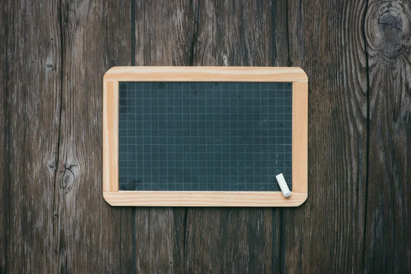 Vintage blackboard with chalk — Stock Photo, Image