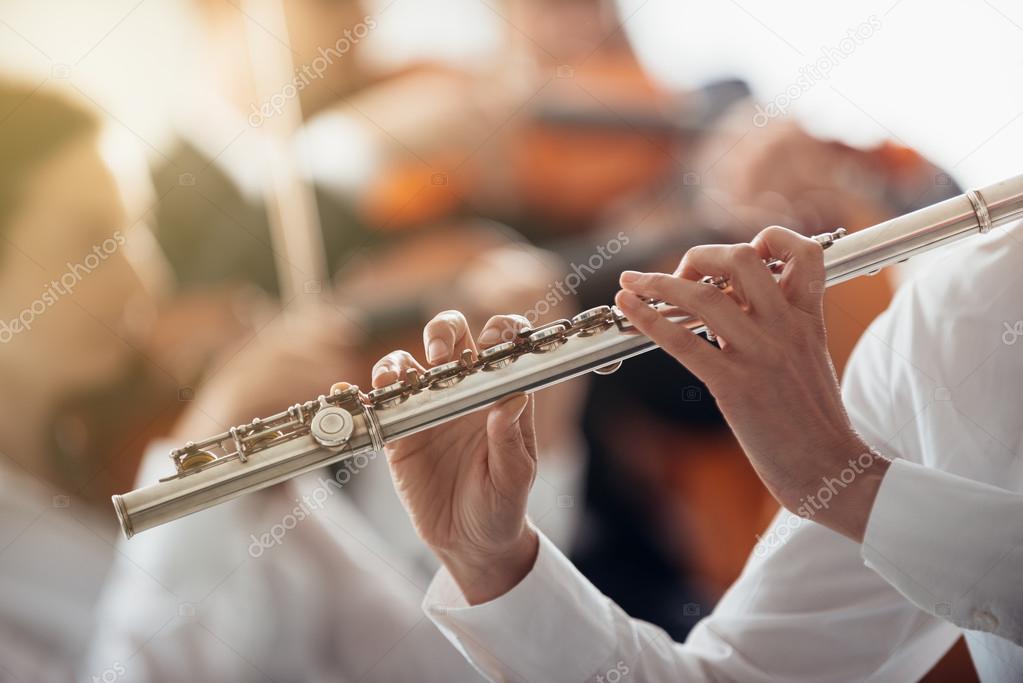 Professional flute player performing