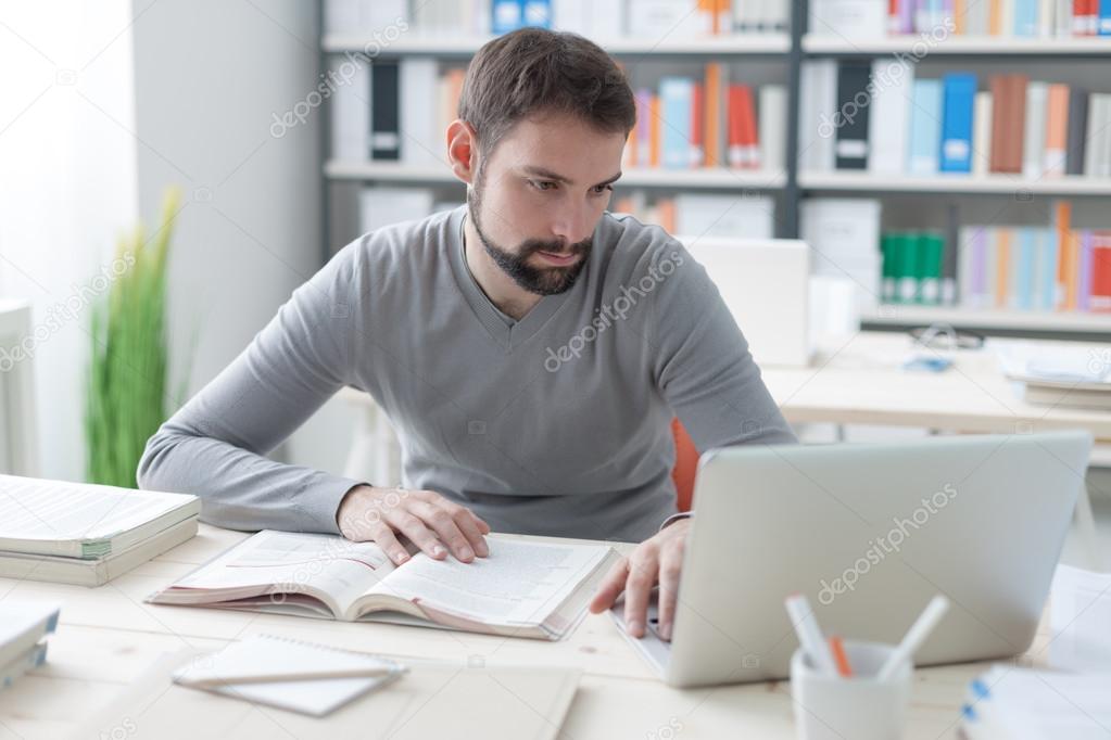 Man studying and connecting with a laptop