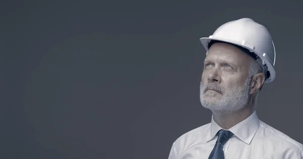 Confident Businessman Engineer Posing Safety Helmet Looking Away Thinking — Stock Photo, Image