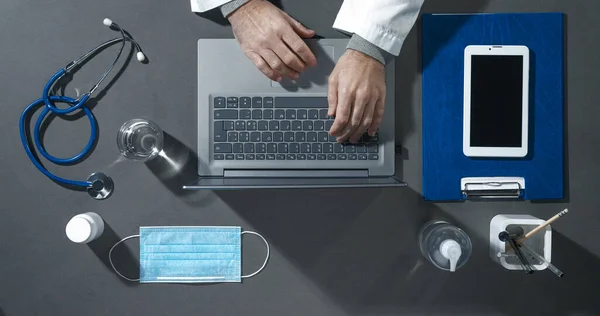 Professional Doctor Working Office Desk Typing Laptop Has Hand Sanitizer — Stock Photo, Image